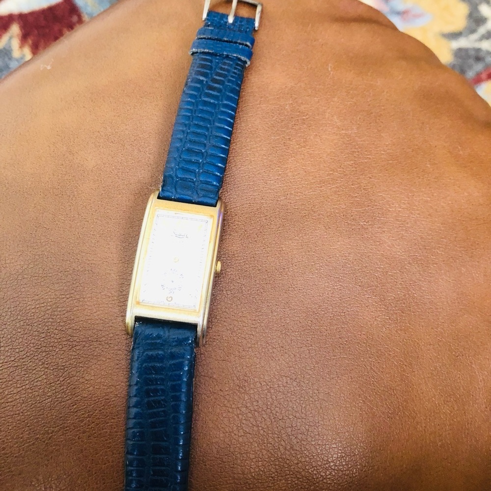 Gold Rectangular Watch With Blue Strap - image 1